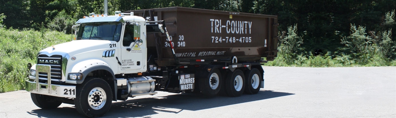 Tri-County garbage truck sitting outside in Grove City, PA.